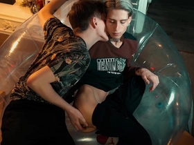 Two sweet guys share an inflatable chair. gang chinese gay porn